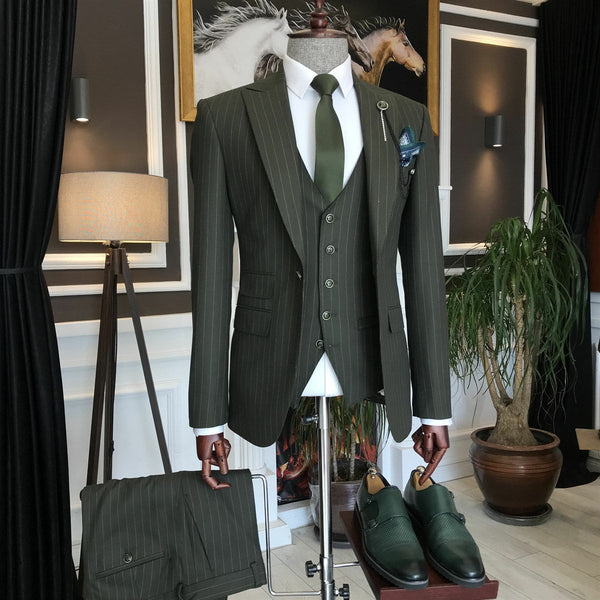 What tie to wear with this green suit? I usually wear the one in the last  photo but was thinking of just using the pocket square and a new tie. For a